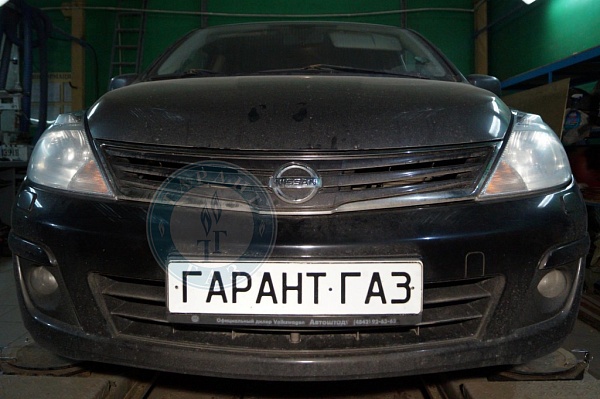 Nissan Tiida 2013 года 110.1 л.с. 1598