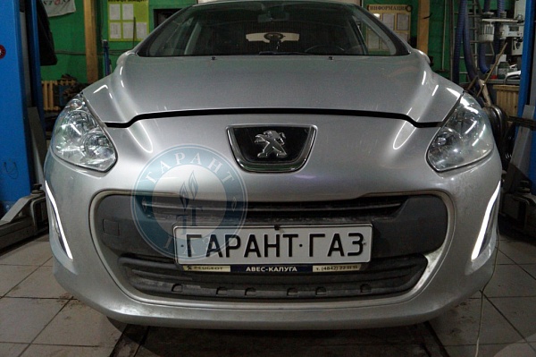 Peugeot 308 2012 года 119.6 л.с. 1598