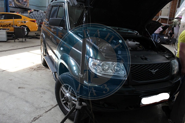 УАЗ Patriot 2010 года 127.8 л.с. 2693