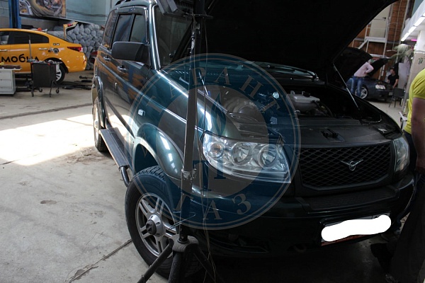 УАЗ Patriot 2010 года 127.8 л.с. 2693